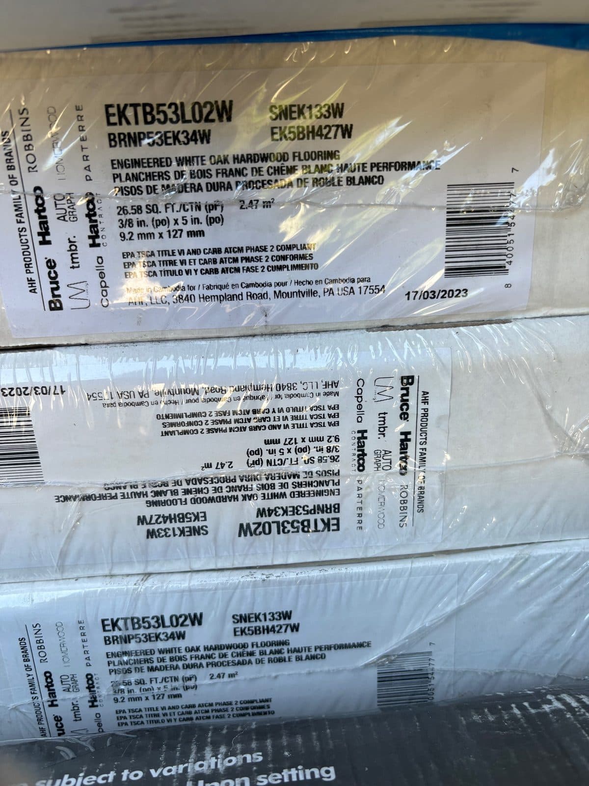 12 unopened boxes of hardwood flooring