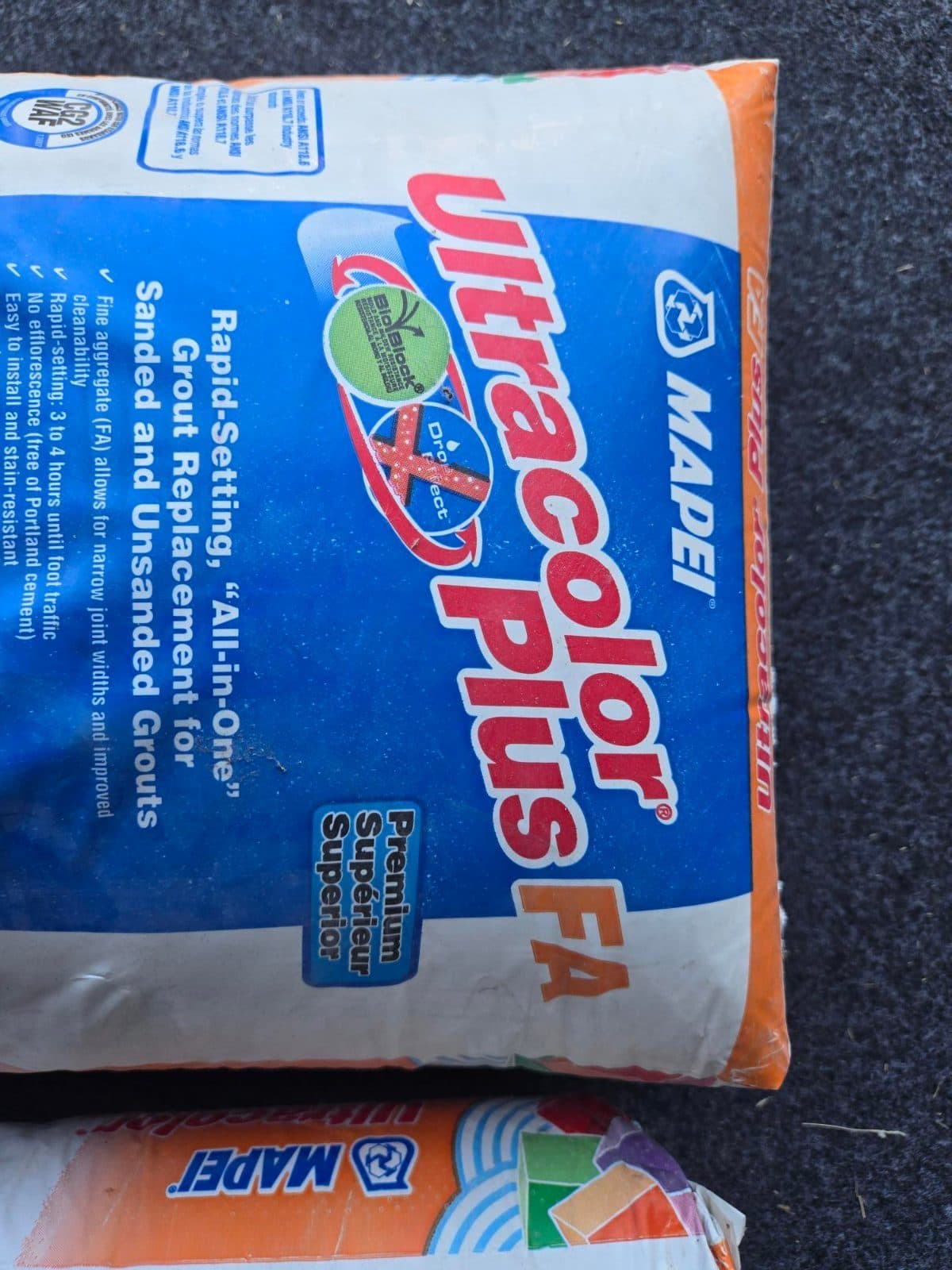 MAPEI Ultracolor Plus FA ultra-premium, fast-setting, "all-in-one" sanded grout.  3