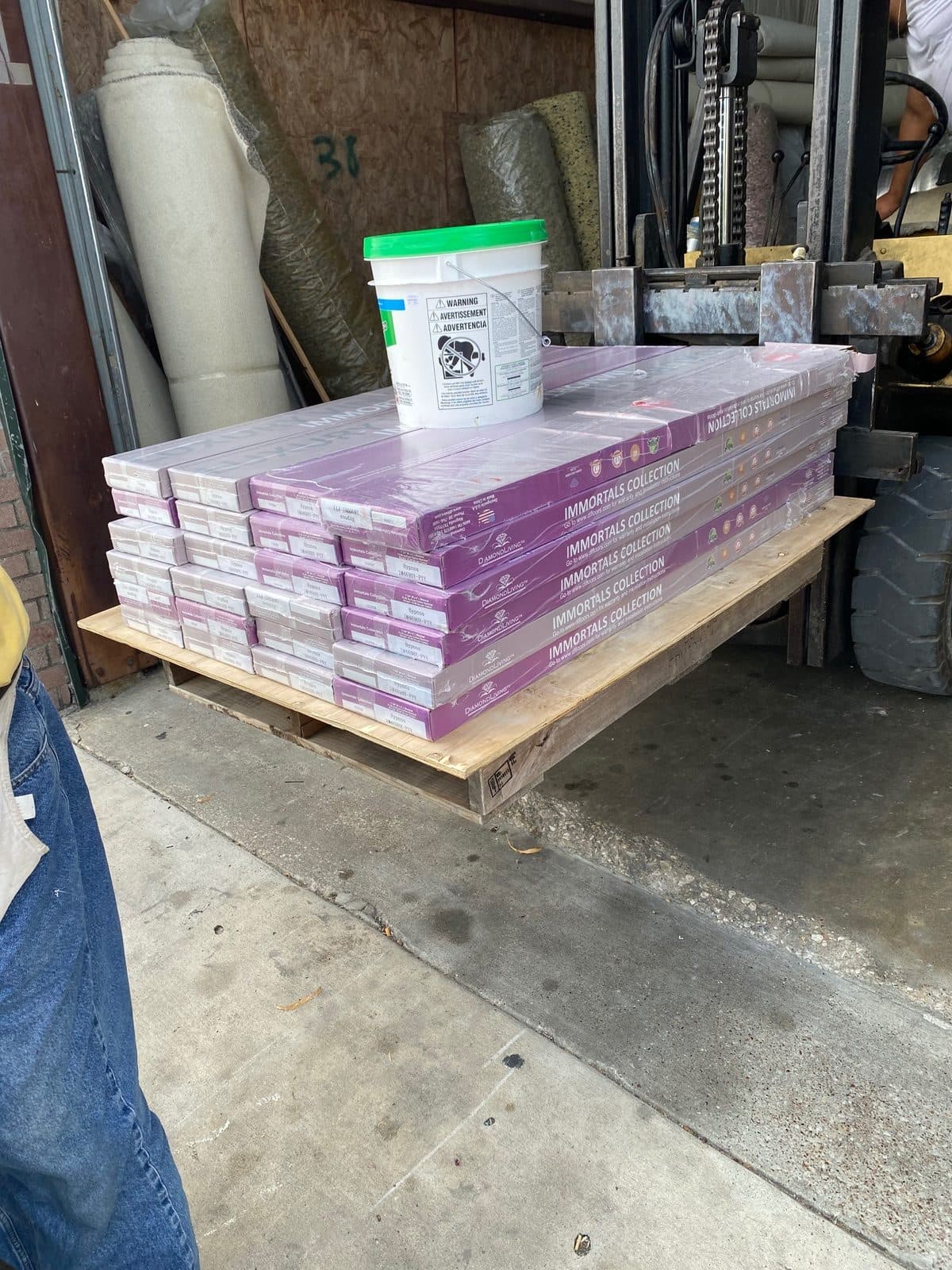 Luxury vinyl tile and adhesive