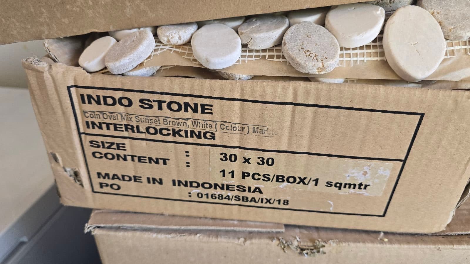 Interlocking coin stone pebble for shower
