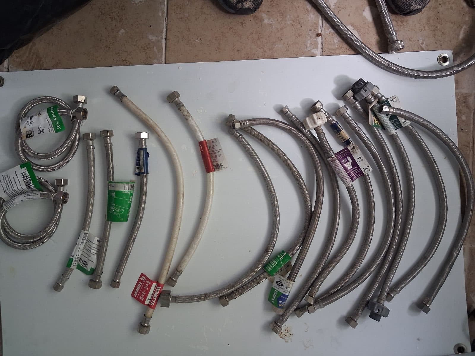 Selling a bulk lot of flexible water supply lines for faucets and toilets. Great deal for handymen, plumbers, landlords, or DIYers looking to stock up on hardware. Includes: 12+ Braided Stainless St