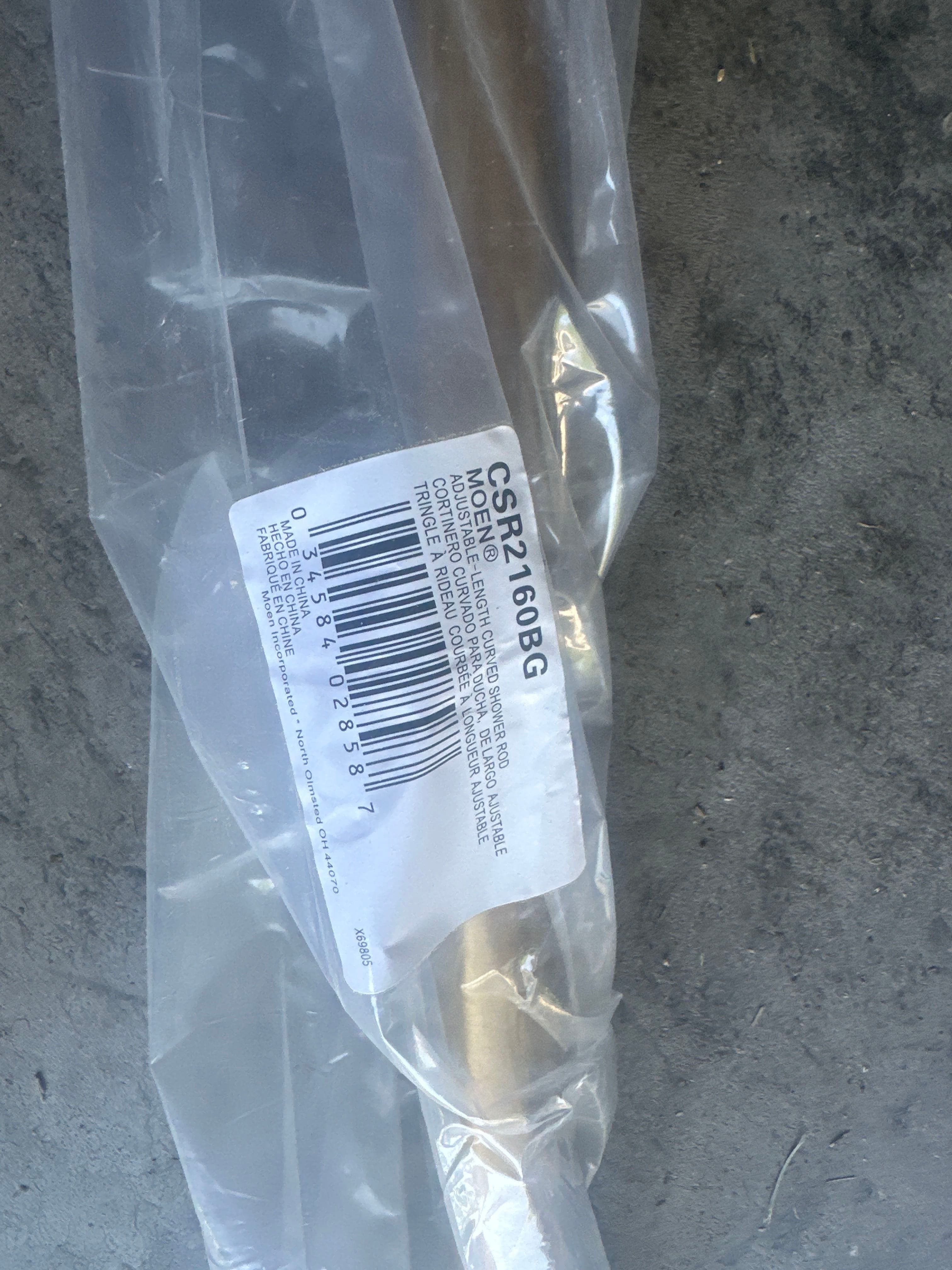 Moen curved shower curtains, brand new in packaging with hardware. Have 21 Champagne Beonze and 9 Black