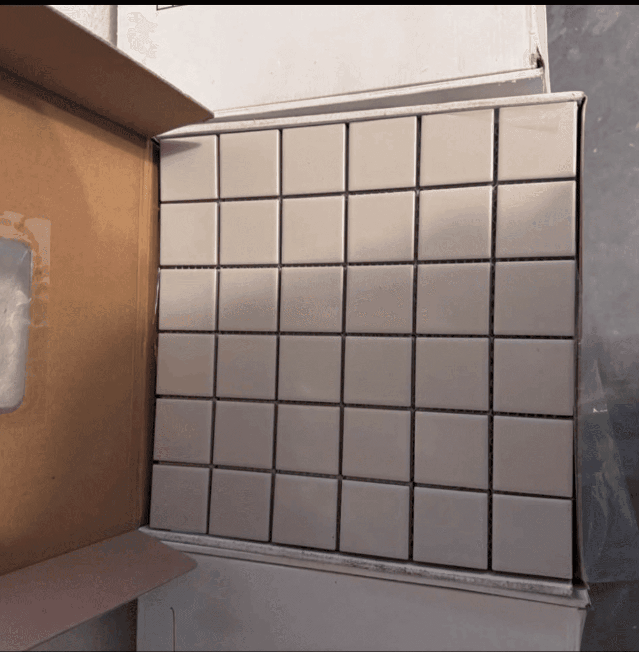 320 sq ft porcelain tile – 12x12 sheets– new in boxes – leftover from renovation – Color: Taupe